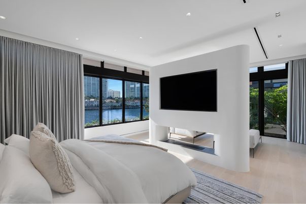 Bedroom, Fireplace, Interior, Recessed Lighting, Water, Wood Texture Flooring