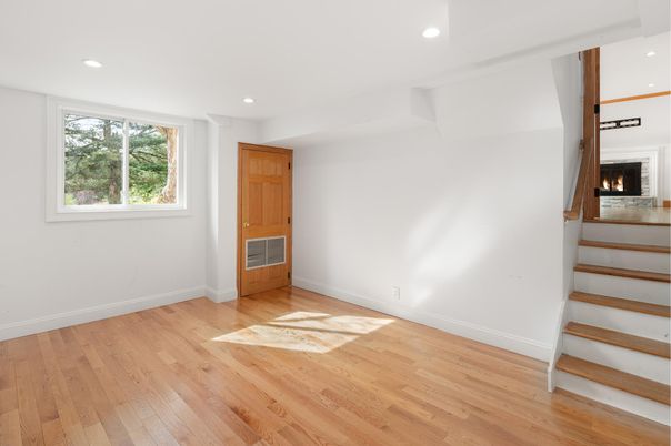 Empty room, Fireplace, Interior, Recessed Lighting, Wood Texture Flooring