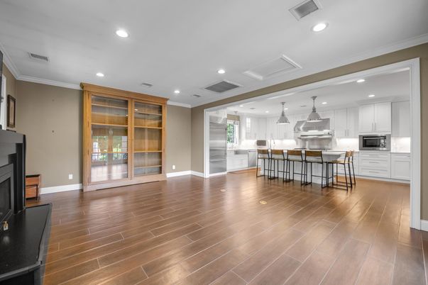 Fireplace, Interior, Kitchen, Pendant Lights, Recessed Lighting, Stainless Steel Appliances, Wood Texture Flooring