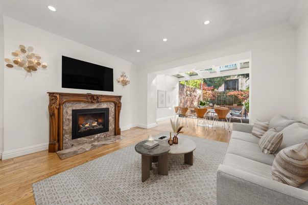 Dining room, Fireplace, Interior, Living room, Recessed Lighting, Wood Texture Flooring