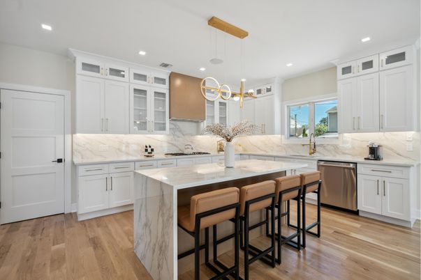 Interior, Kitchen, Marble Walls, Pendant Lights, Recessed Lighting, Stainless Steel Appliances, Wood Texture Flooring