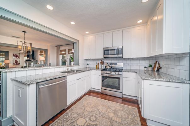 Dining room, Interior, Kitchen, Pendant Lights, Recessed Lighting, Stainless Steel Appliances, Wood Texture Flooring