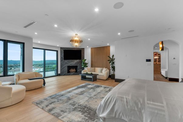 Bedroom, Fireplace, Interior, Recessed Lighting, Water, Wood Texture Flooring