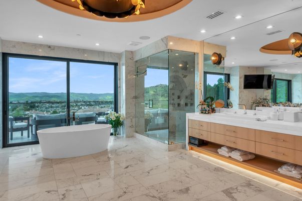 Bathroom, Dual Sink Vanities, Free Standing Baths, Glass Shower, Interior, Marble, Marble Walls, Recessed Lighting