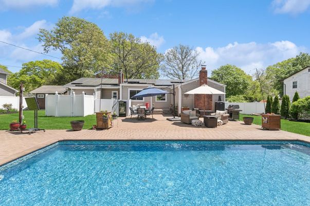 Exterior, Pool, Solar Panels