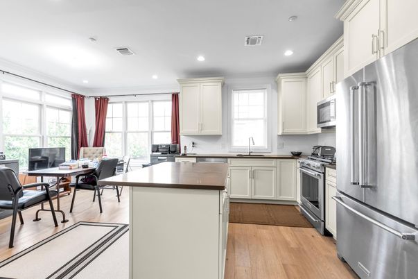 Dining room, Interior, Kitchen, Recessed Lighting, Stainless Steel Appliances, Wood Texture Flooring