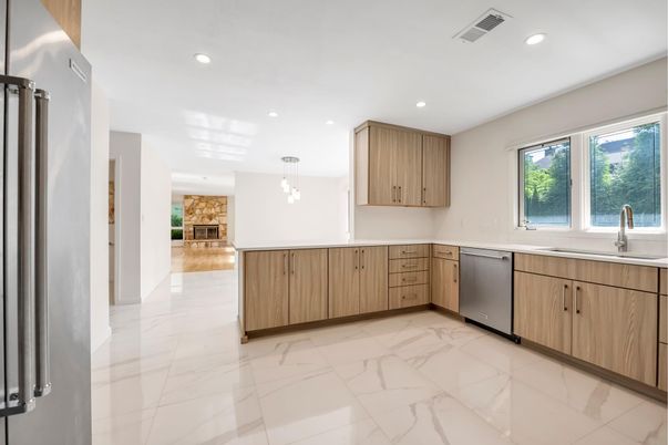 Fireplace, Interior, Kitchen, Marble, Pendant Lights, Recessed Lighting, Stainless Steel Appliances