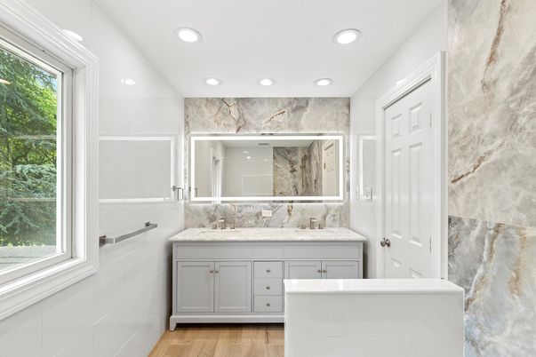 Bathroom, Dual Sink Vanities, Interior, Marble Walls, Recessed Lighting, Wood Texture Flooring