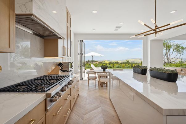 Dining room, Interior, Kitchen, Marble Walls, Pendant Lights, Recessed Lighting, Stainless Steel Appliances, Wood Texture Flooring
