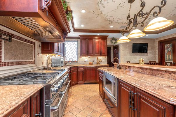 Interior, Kitchen, Pendant Lights, Recessed Lighting, Stainless Steel Appliances, Stone Walls
