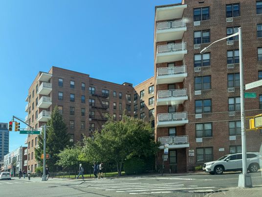 Exterior, Facade, Brick Facade, Condo Building