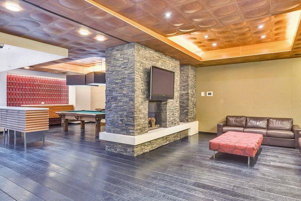 Billiard Table, Fireplace, Game Room, Interior, Pendant Lights, Recessed Lighting, Stone Walls, Wood Texture Flooring