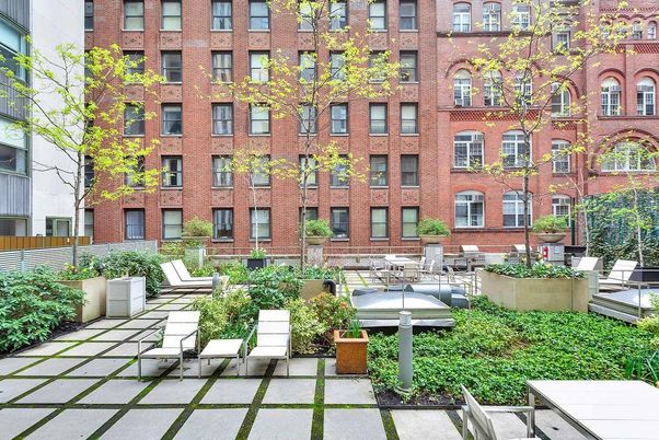 Exterior, Facade, Brick Facade, Condo Building