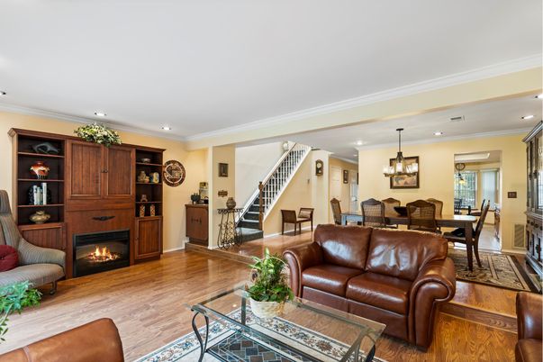 Chandelier, Dining room, Fireplace, Interior, Living room, Recessed Lighting, Wood Texture Flooring