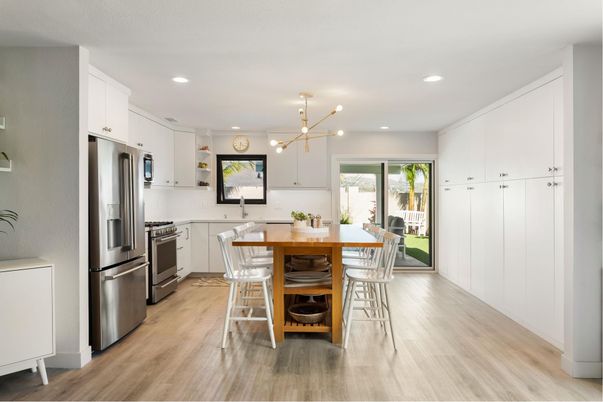 Dining room, Interior, Kitchen, Pendant Lights, Recessed Lighting, Stainless Steel Appliances, Wood Texture Flooring