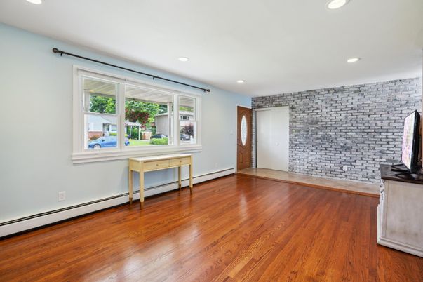 Empty room, Interior, Recessed Lighting, Stone Walls, Wood Texture Flooring