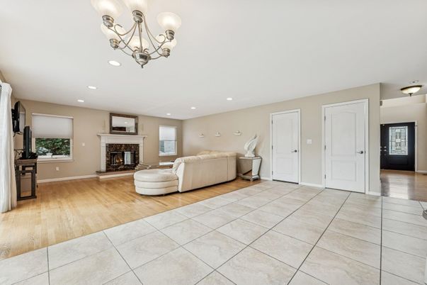 Chandelier, Fireplace, Interior, Living room, Recessed Lighting, Wood Texture Flooring