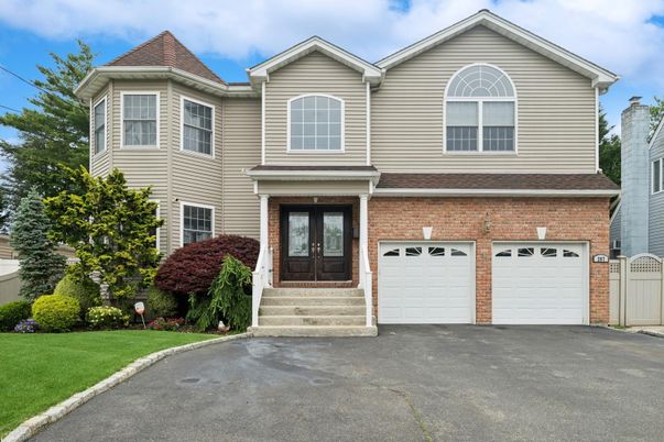 Attached, Exterior, Facade, Brick Facade, Rowhouse
