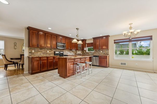 Chandelier, Dining room, Interior, Kitchen, Pendant Lights, Recessed Lighting, Stainless Steel Appliances