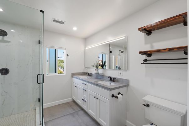 Bathroom, Dual Sink Vanities, Glass Shower, Interior, Marble Walls, Recessed Lighting
