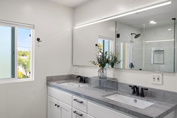 Bathroom, Dual Sink Vanities, Glass Shower, Interior, Marble Walls, Recessed Lighting