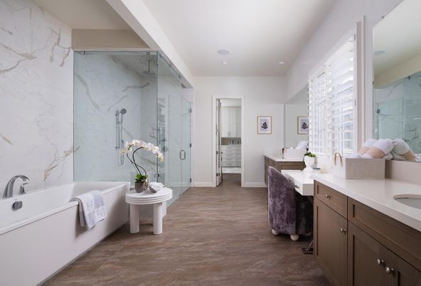 Bathroom, Dual Sink Vanities, Free Standing Baths, Glass Shower, Interior, Marble Walls, Recessed Lighting, Wood Texture Flooring