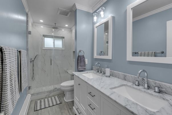 Bathroom, Dual Sink Vanities, Glass Shower, Interior, Marble Walls, Recessed Lighting