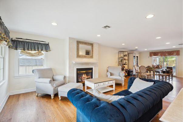 Dining room, Fireplace, Interior, Living room, Recessed Lighting, Wood Texture Flooring