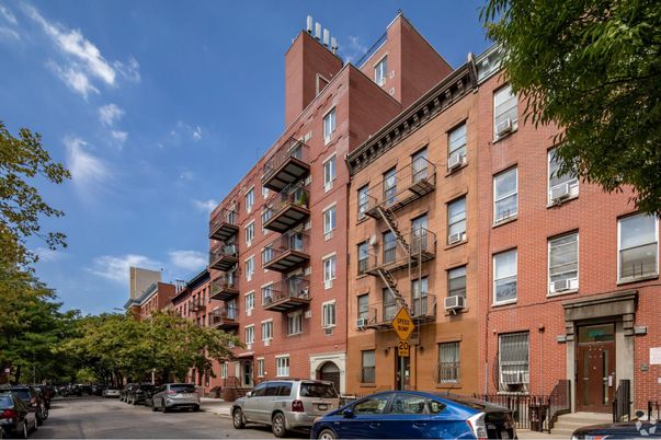 Exterior, Facade, Brick Facade, Condo Building