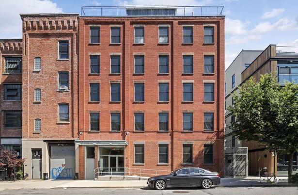 Exterior, Facade, Brick Facade, Condo Building
