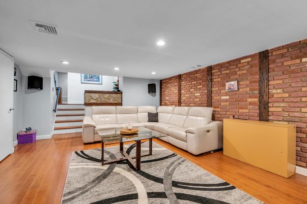 Interior, Living room, Recessed Lighting, Stone Walls, Wood Texture Flooring