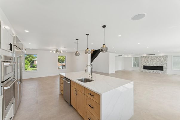 Fireplace, Interior, Kitchen, Pendant Lights, Recessed Lighting, Stainless Steel Appliances