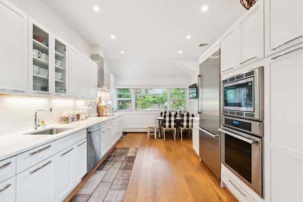 Dining room, Interior, Kitchen, Recessed Lighting, Stainless Steel Appliances, Wood Texture Flooring