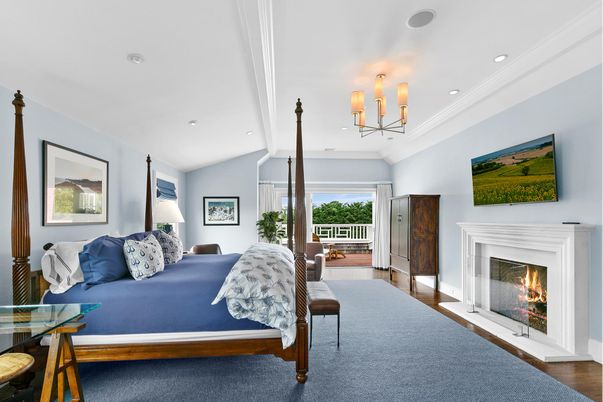 Bedroom, Chandelier, Fireplace, Interior, Recessed Lighting, Wood Texture Flooring