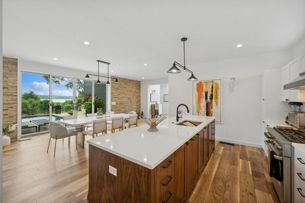 Dining room, Interior, Kitchen, Pendant Lights, Recessed Lighting, Stainless Steel Appliances, Stone Walls, Wood Texture Flooring