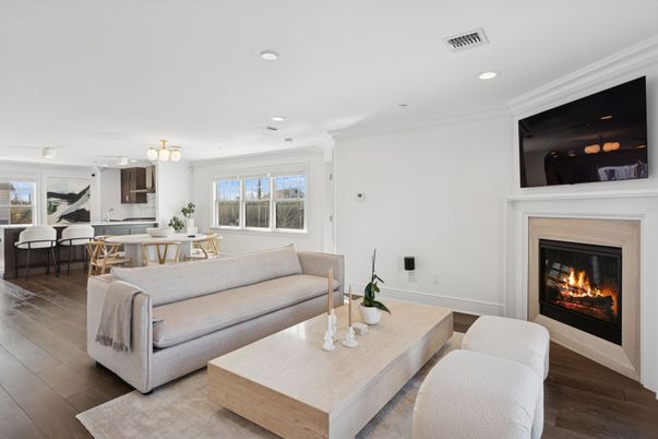 Dining room, Fireplace, Interior, Living room, Pendant Lights, Recessed Lighting, Wood Texture Flooring