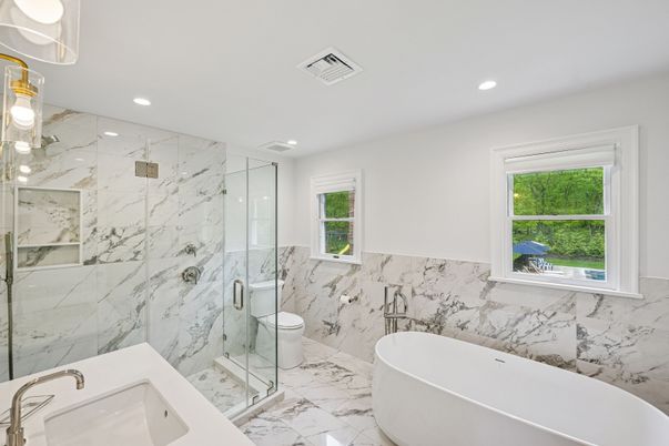 Bathroom, Free Standing Baths, Glass Shower, Interior, Marble, Marble Walls, Recessed Lighting