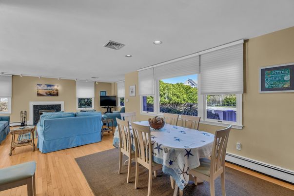 Dining room, Fireplace, Interior, Living room, Recessed Lighting, Wood Texture Flooring