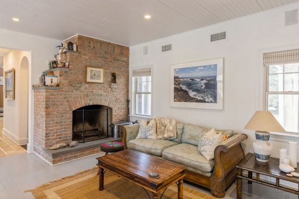 Fireplace, Interior, Living room, Recessed Lighting, Stone Walls, Wood Texture Flooring