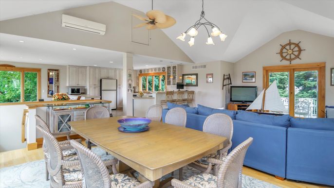 Chandelier, Dining room, Interior, Kitchen, Living room, Pendant Lights, Recessed Lighting, Stainless Steel Appliances, Wood Texture Flooring