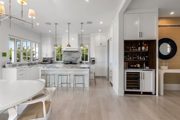 Interior, Kitchen, Marble Walls, Pendant Lights, Recessed Lighting, Wood Texture Flooring