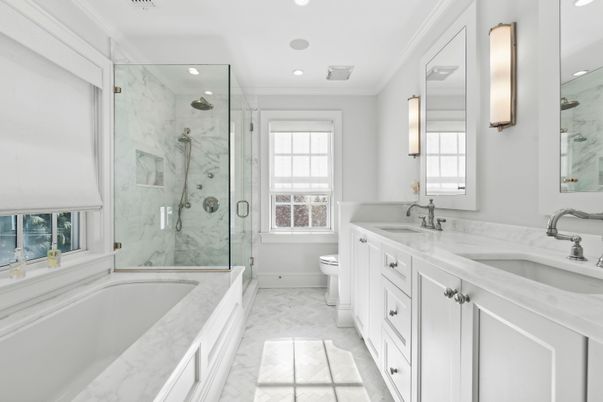 Bathroom, Dual Sink Vanities, Glass Shower, Interior, Marble, Marble Walls, Recessed Lighting