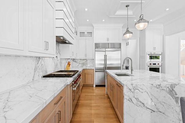 Interior, Kitchen, Marble Walls, Pendant Lights, Recessed Lighting, Stainless Steel Appliances, Wood Texture Flooring