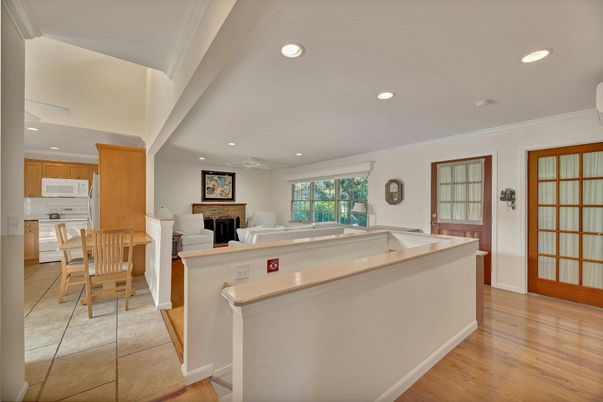Dining room, Fireplace, Interior, Kitchen, Recessed Lighting, Wood Texture Flooring