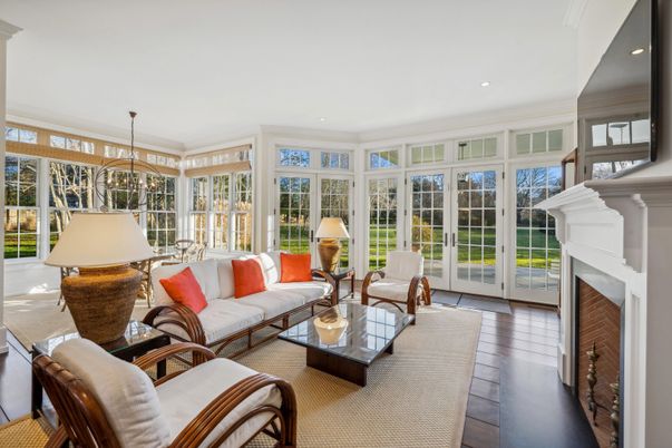 Fireplace, Interior, Living room, Recessed Lighting, Sun Room, Wood Texture Flooring