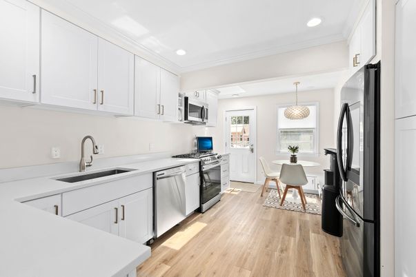 Dining room, Interior, Kitchen, Pendant Lights, Recessed Lighting, Stainless Steel Appliances, Wood Texture Flooring