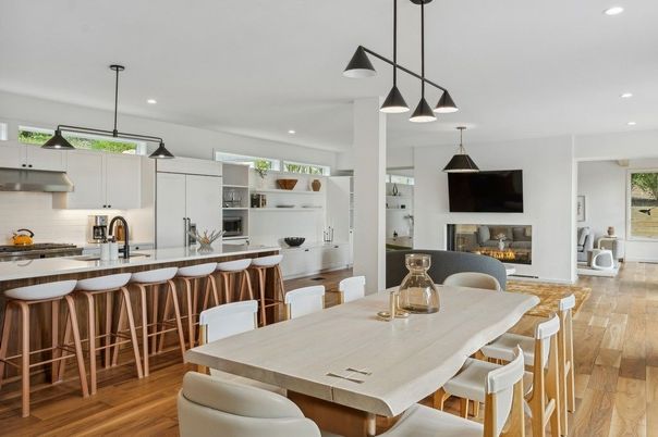 Dining room, Fireplace, Interior, Kitchen, Pendant Lights, Recessed Lighting, Stainless Steel Appliances, Wood Texture Flooring