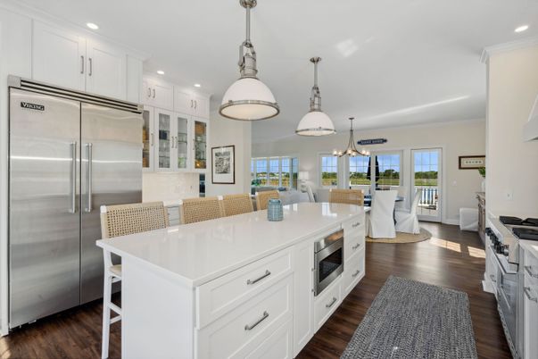 Dining room, Interior, Kitchen, Living room, Pendant Lights, Recessed Lighting, Stainless Steel Appliances, Wood Texture Flooring