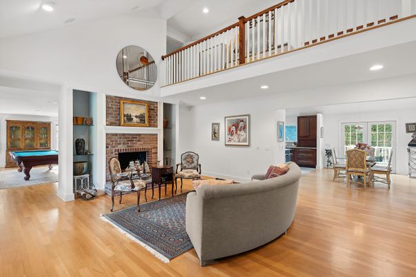 Billiard Table, Dining room, Fireplace, Game Room, Interior, Living room, Recessed Lighting, Wood Texture Flooring