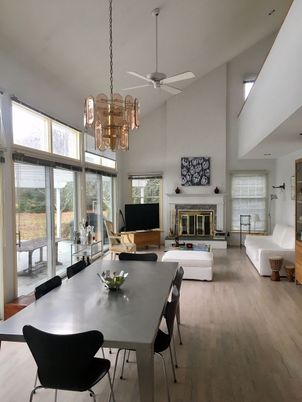 Chandelier, Dining room, Fireplace, Interior, Living room, Pendant Lights, Wood Texture Flooring